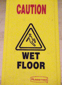 Rubbermaid brand wet floor sign